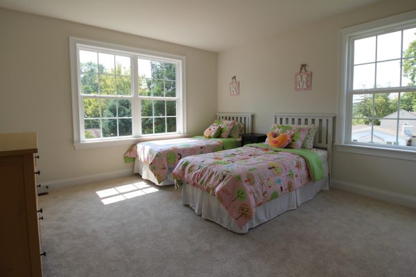A bedroom that is spacious & bright