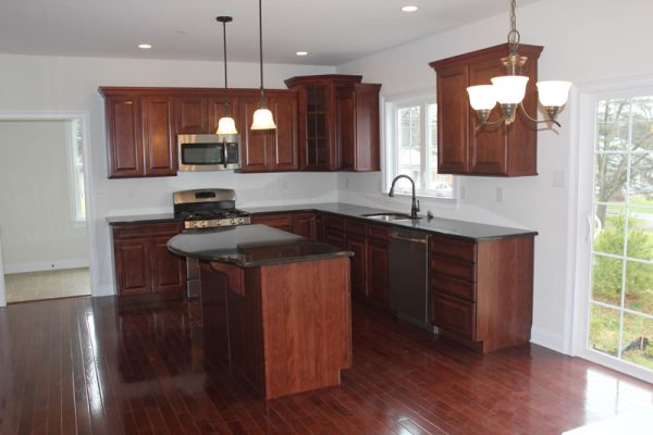 Custom kitchen featuring cherry cabinets, granite & island